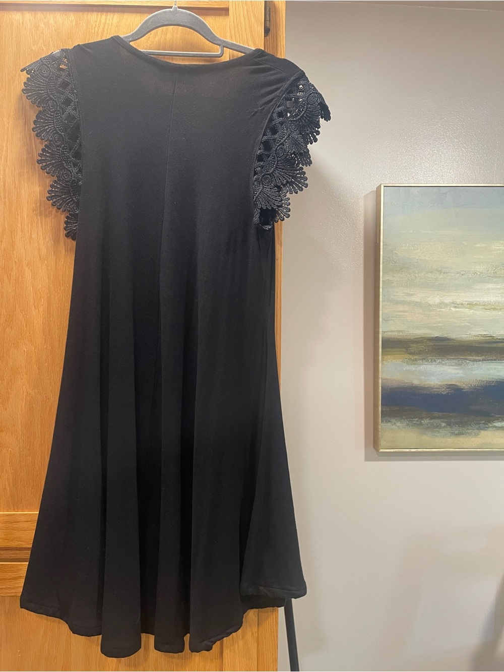 Nik and Nash Elegant Black Midi Dress with Crochet Cap Sleeves